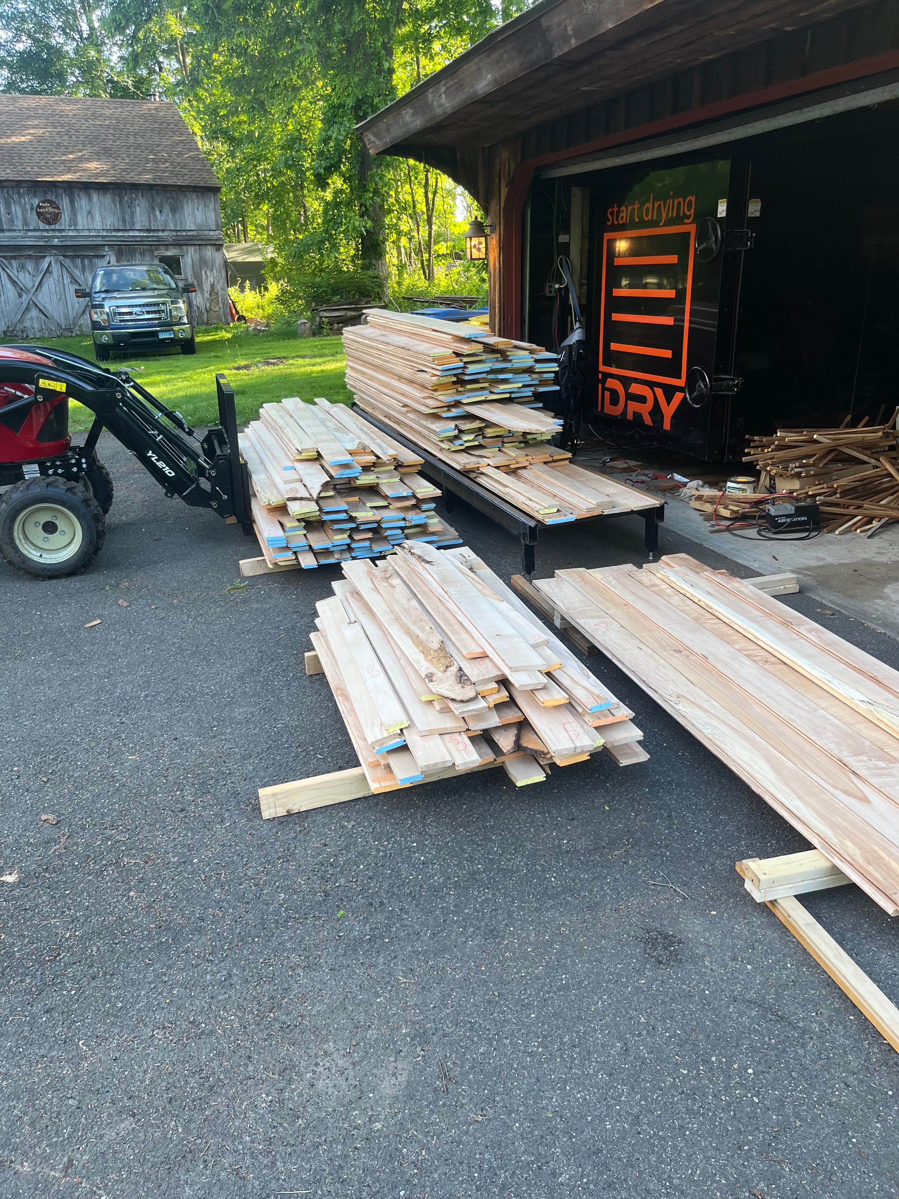 Freshly Milled Slabs Stacked By Kiln Barn | Tougas Timberworks Monroe CT