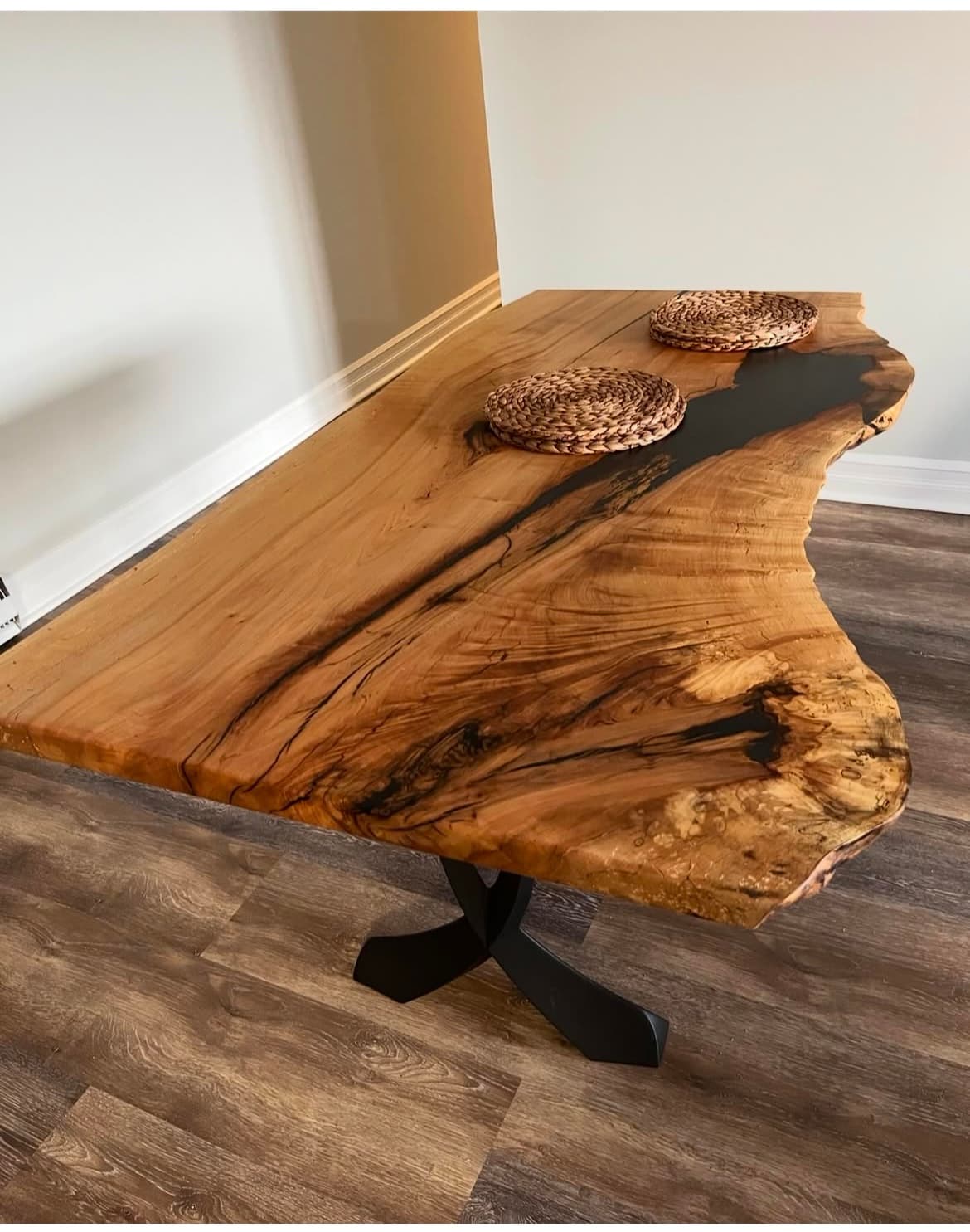 Custom live edge epoxy dining table installed in a Connecticut dining room