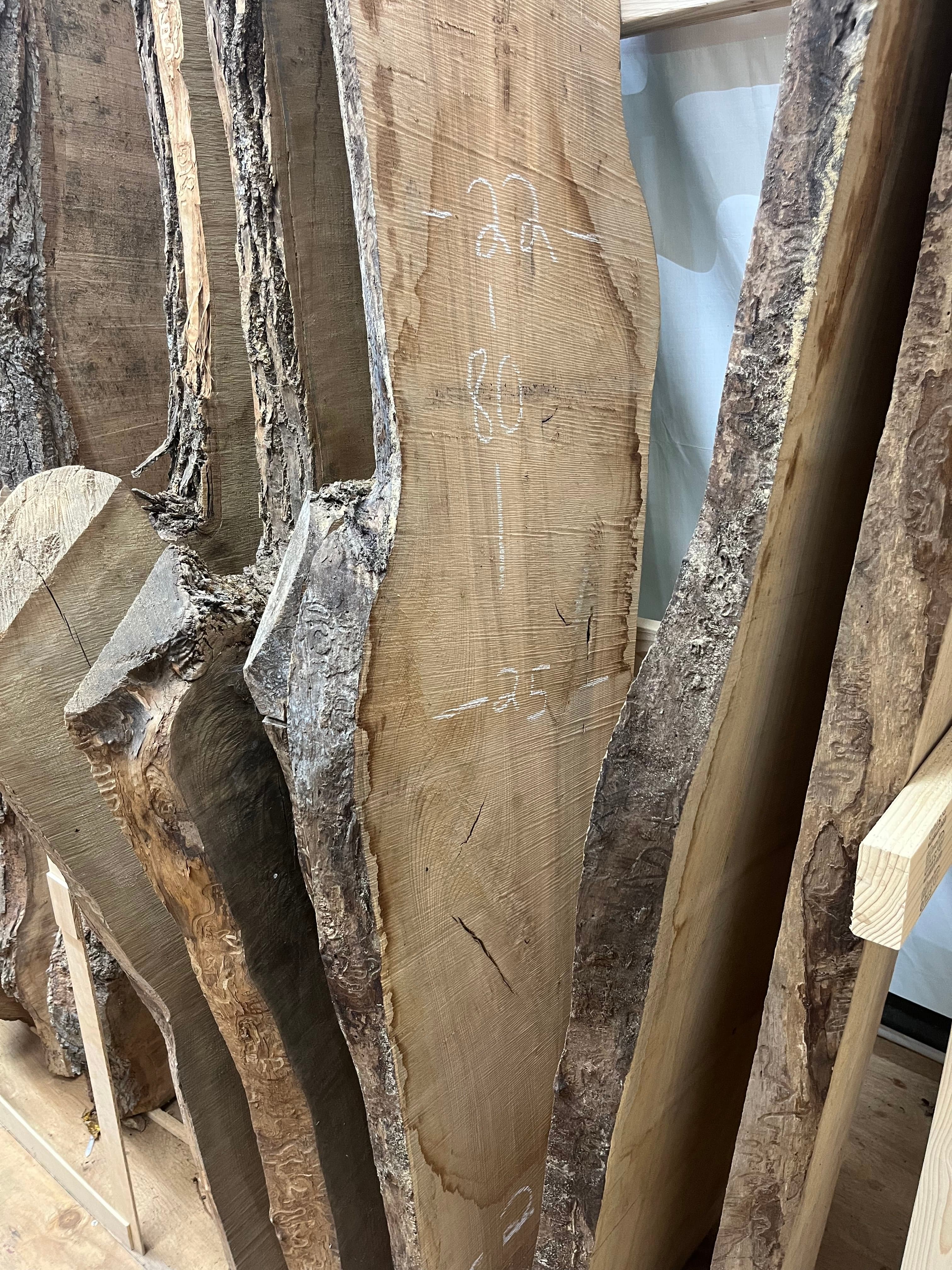 Live Edge Slabs Stacked In Shop | Tougas Timberworks Monroe CT