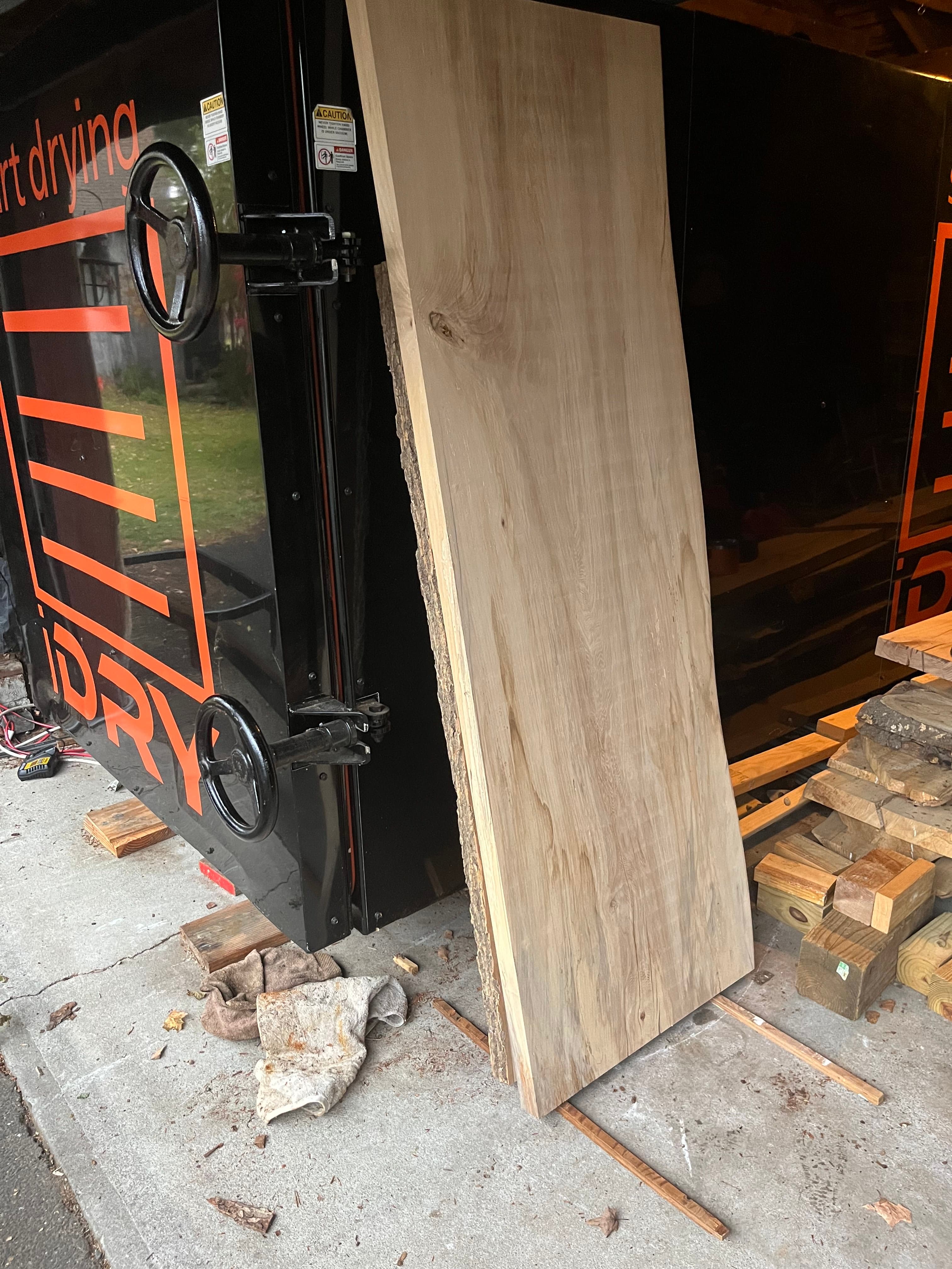 Slabs Being Loaded Into Kiln At Night | Tougas Timberworks Monroe CT