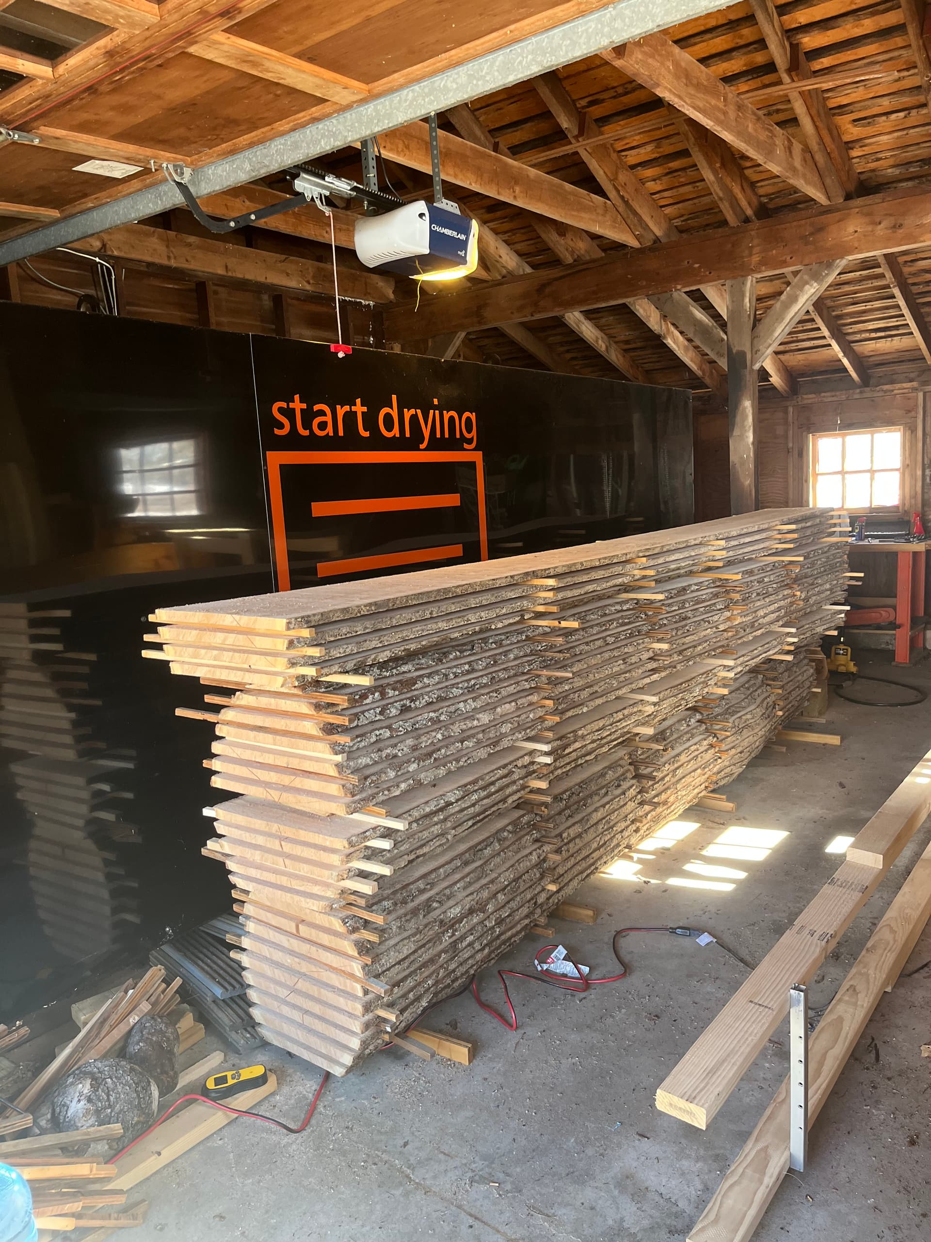 Overhead view of the kiln barn fully loaded with stacked lumber