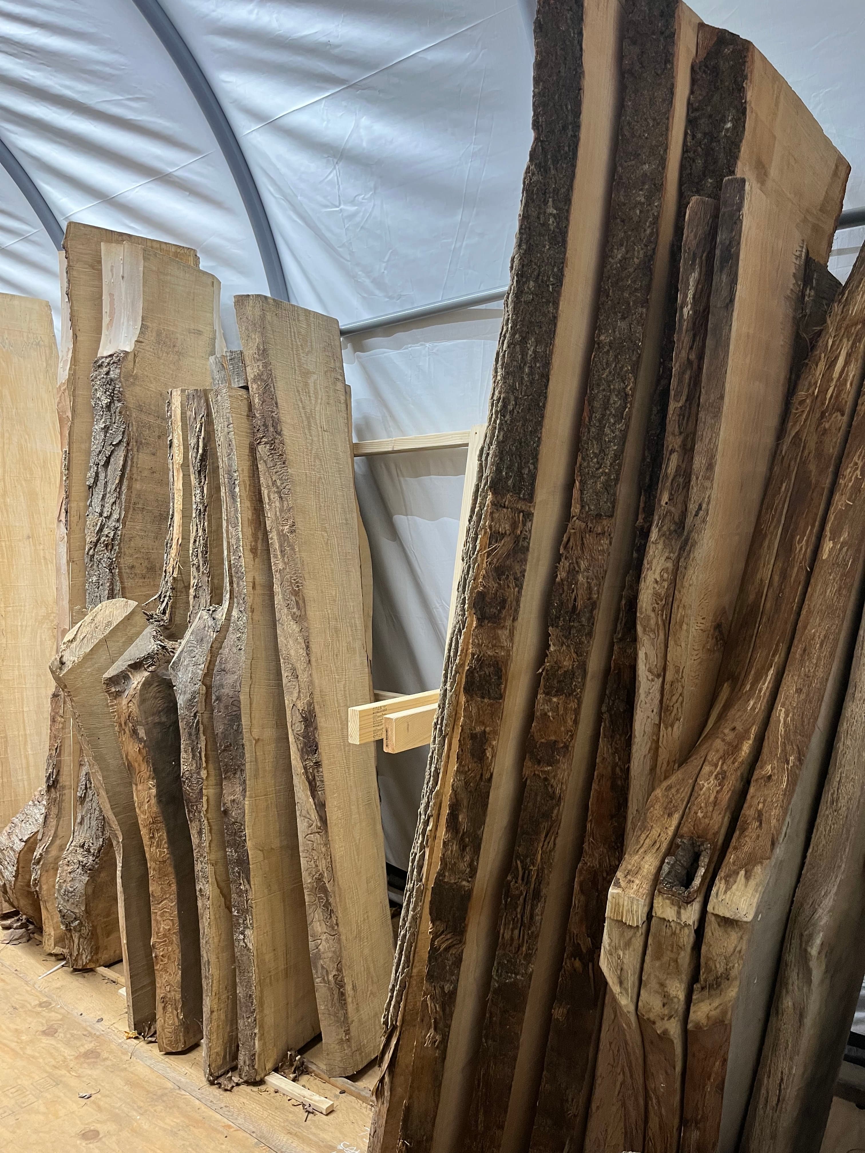 Slabs In Tent Storage End View | Tougas Timberworks Monroe CT