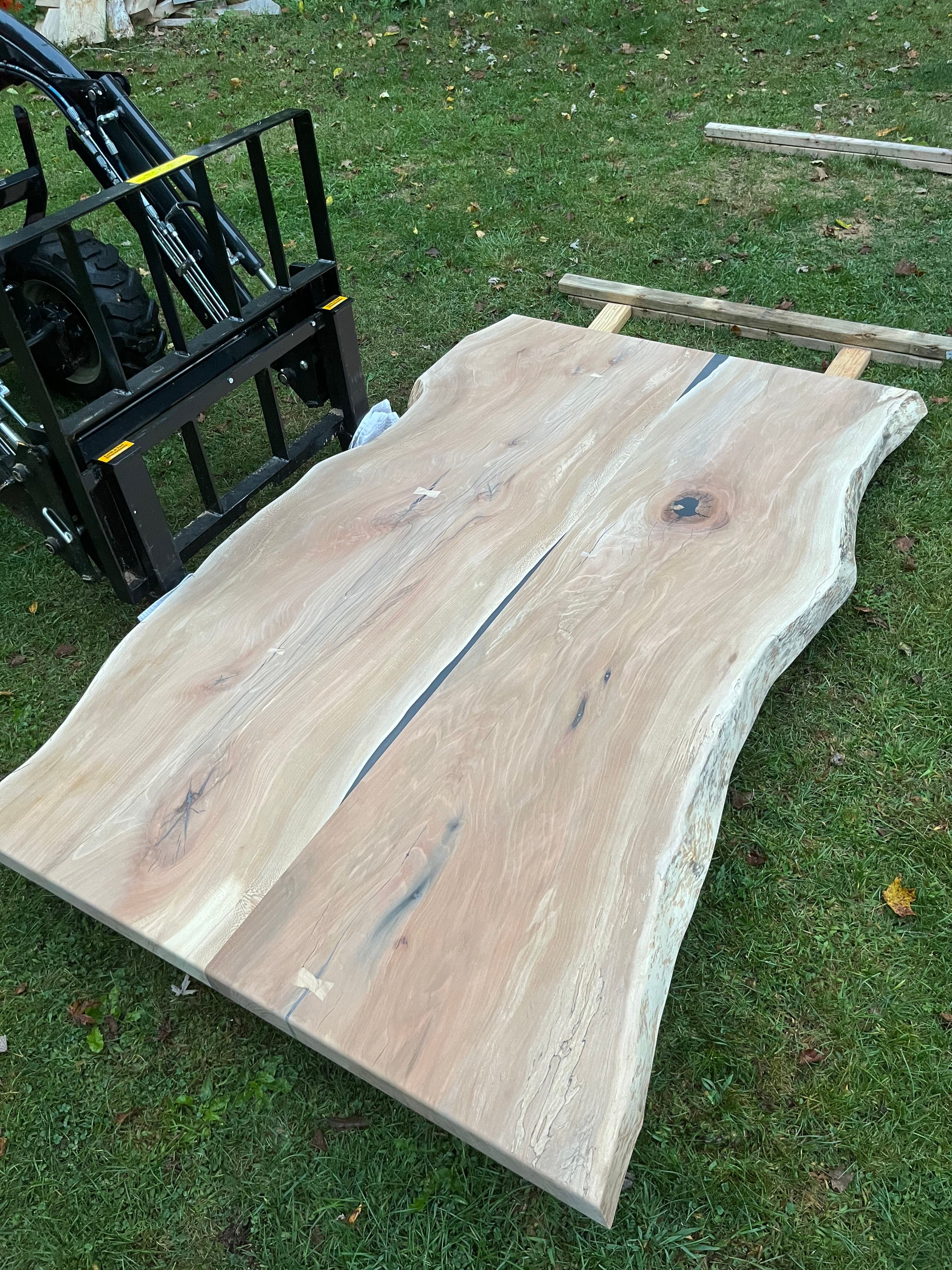 Two Live Edge Slabs Outdoors With Forklift | Tougas Timberworks Monroe CT