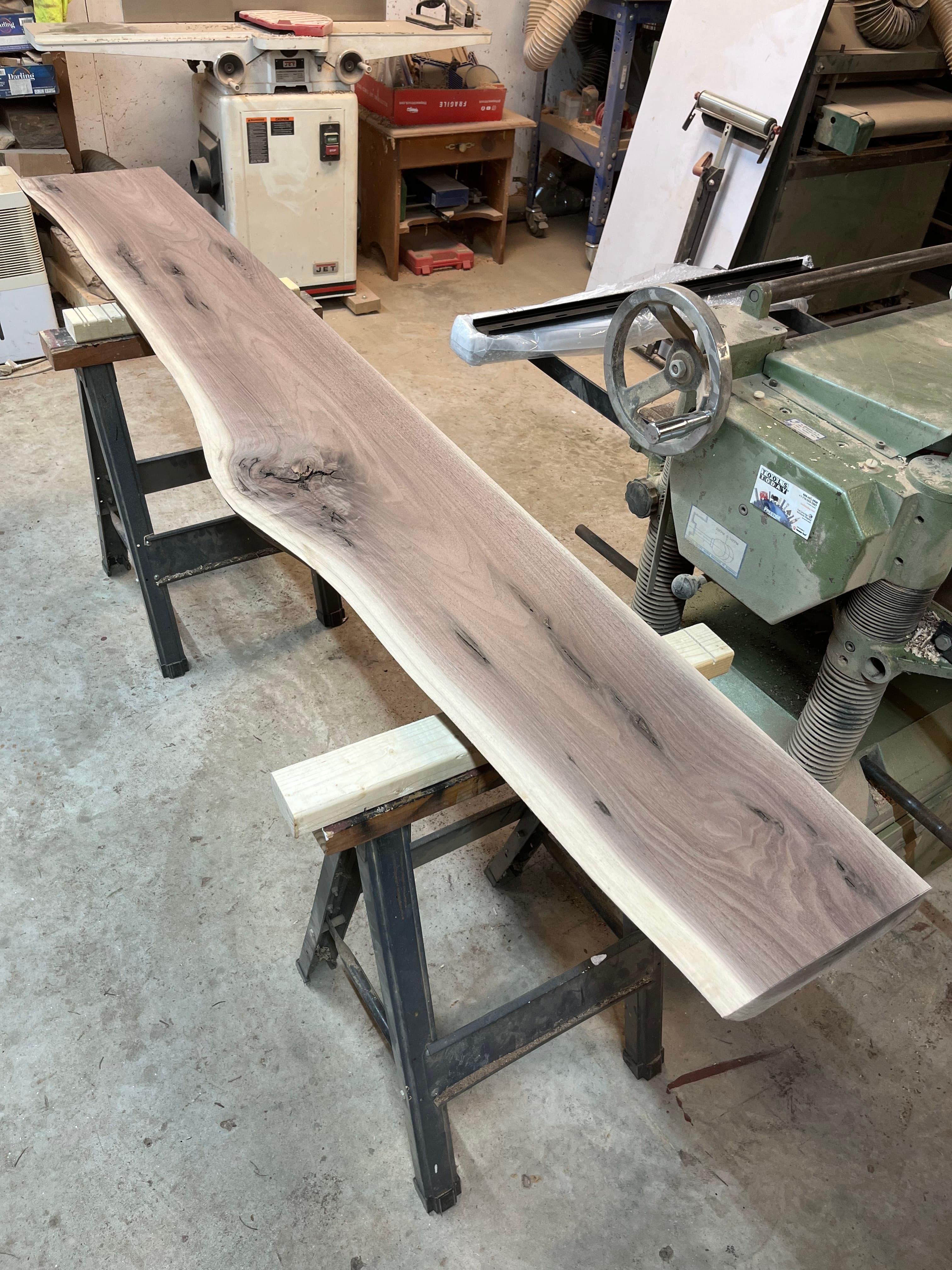 Walnut Slab On Sawhorses In Shop | Tougas Timberworks Monroe CT