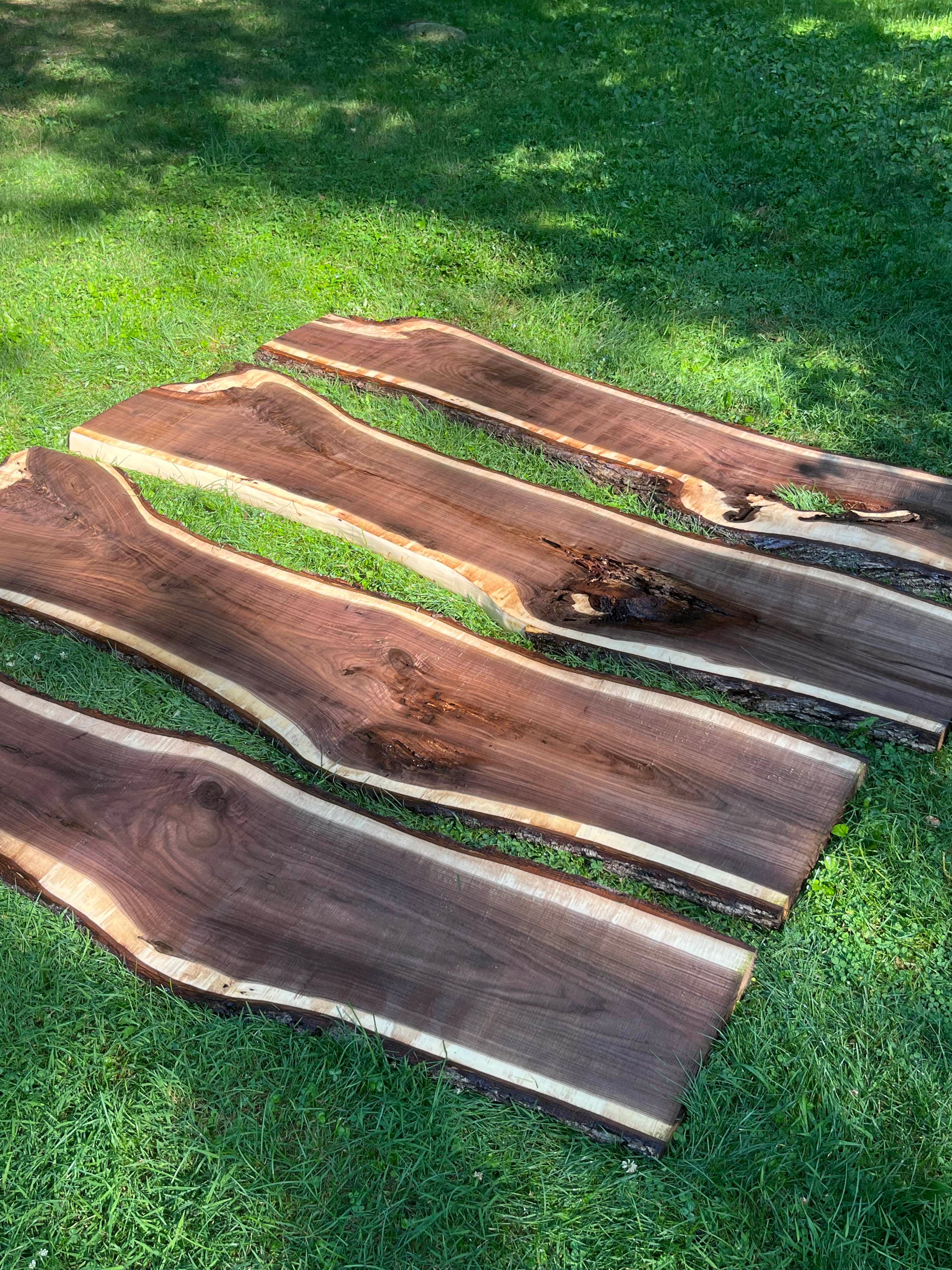 Walnut Slabs Displayed On Grass Aerial | Tougas Timberworks Monroe CT