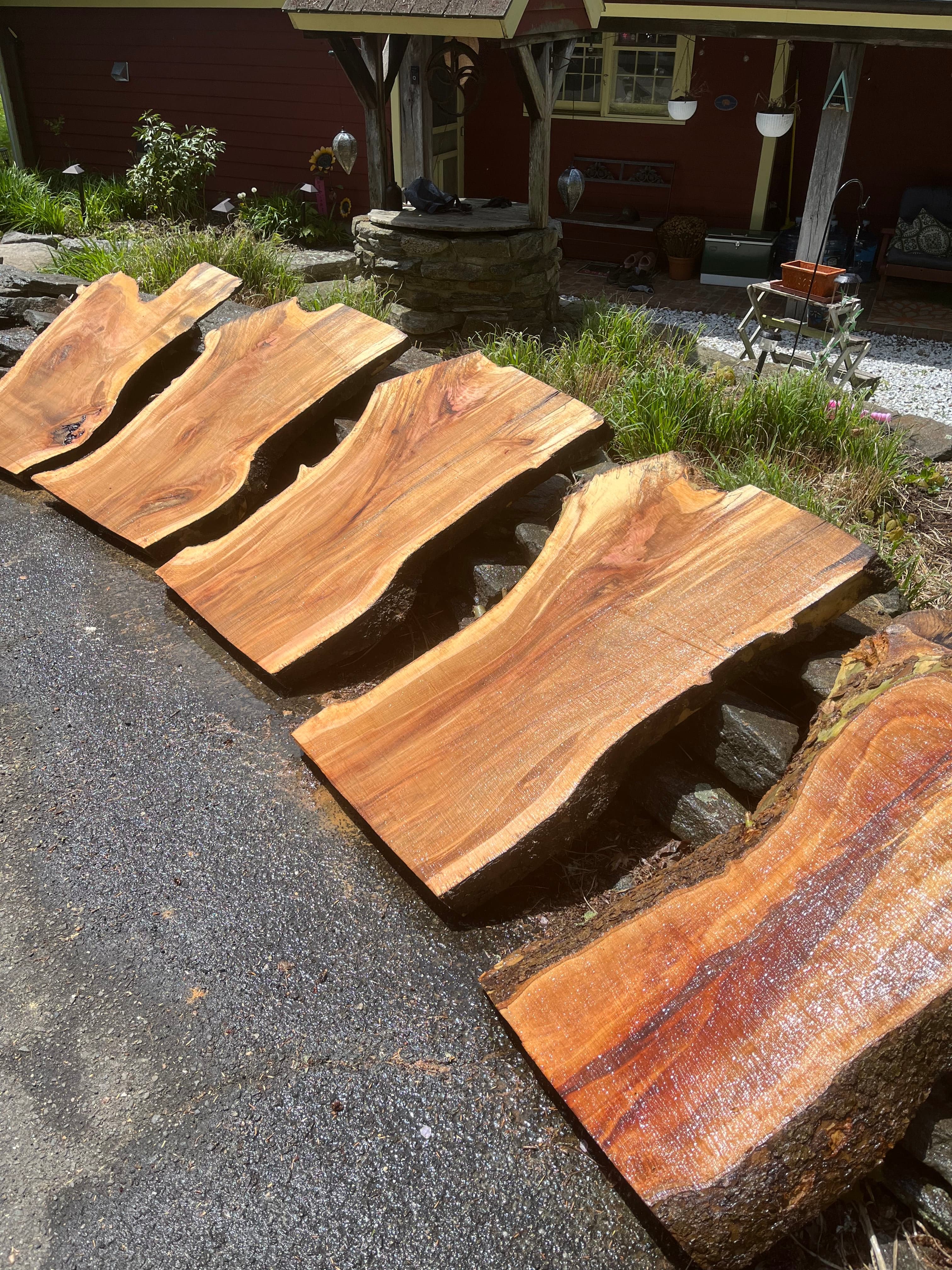 Walnut Slabs Displayed On Rocks Aerial | Tougas Timberworks Monroe CT