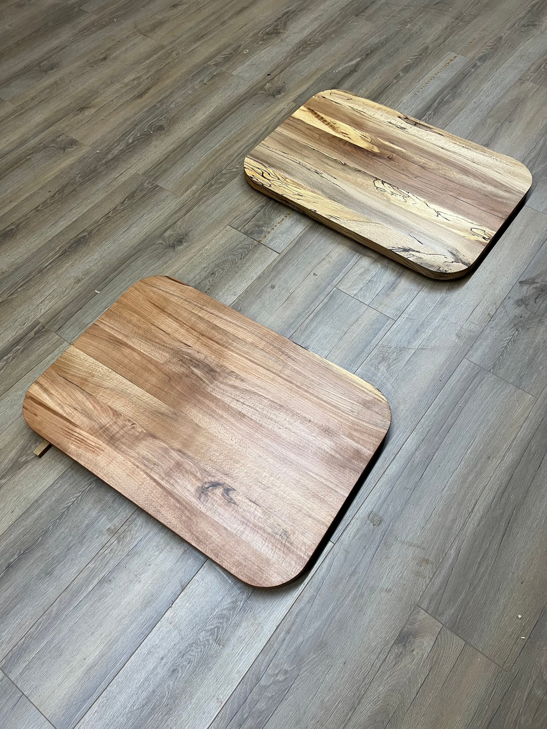 Live edge slab being routed flat with epoxy in the channel